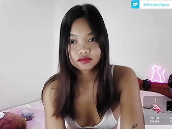 Witness this super hot Chinese teen with a Thai twist live on web cam