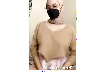 Observe this hijab-wearing teenager with massive innate boobies delectation herself in a insatiable hijab-wearing session