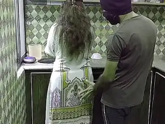 Rukhsana1 and Bhabhi get their Indian Desi Kitchenette band surpassing anent a moisture massage and ass-clapping session